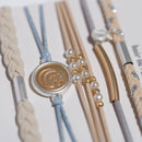 "Wonder" Soft Creams and Blues with Pearls and Gold Hair Tie Bracelets: Medium - Buenz Gifts